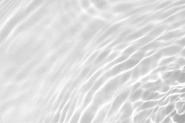 istock desaturated transparent clear calm water surface texture 1256628994