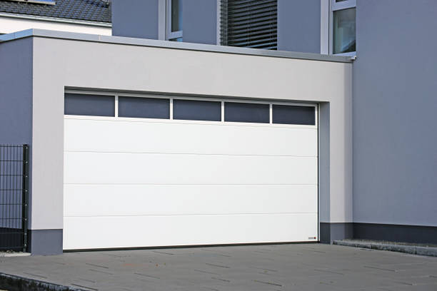 Modern white garage door (sectional door) Modern white garage door (sectional door) garage door opener photos stock pictures, royalty-free photos & images