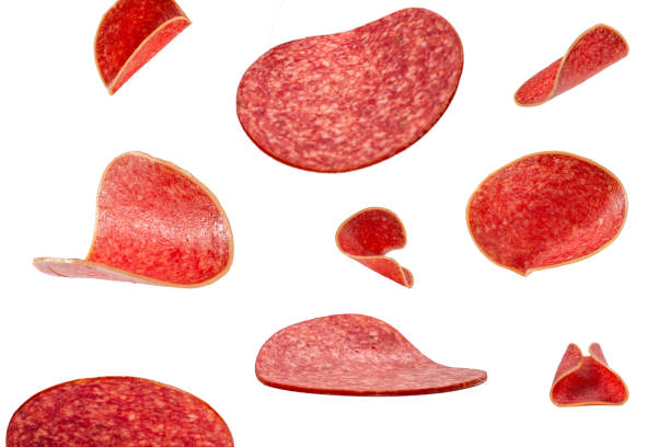 istock Falling tasty salami isolated on white 1256634394