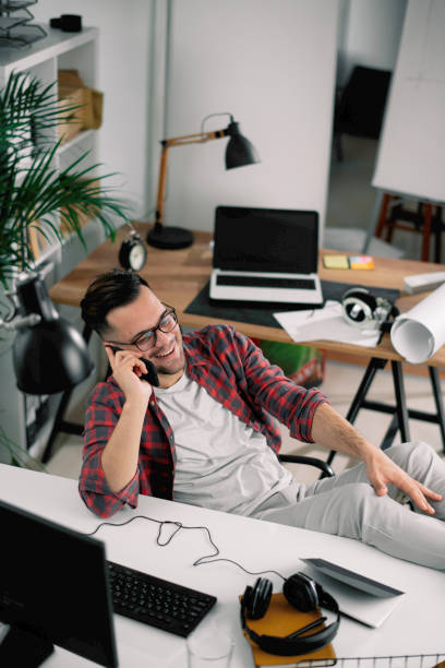 istock Young businessman working in the office. 1256635548