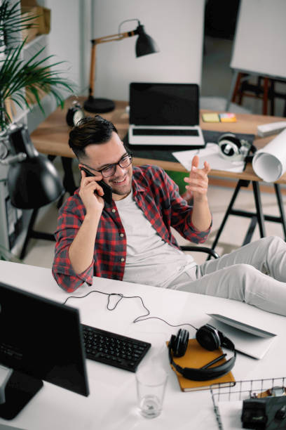 istock Young businessman working in the office. 1256635551