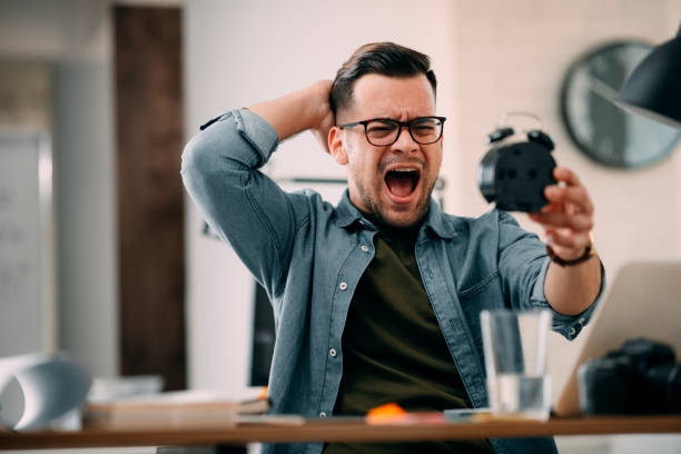 istock Businessman running late on a meeting. 1256635618