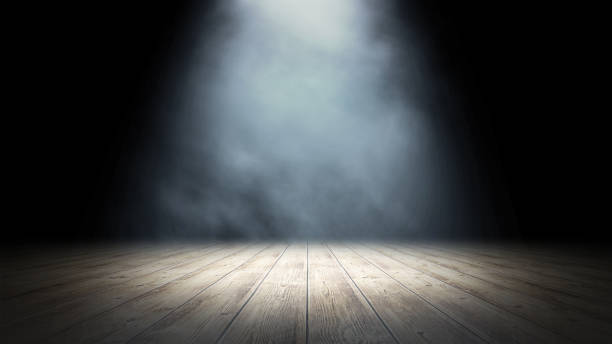 istock Empty stand up scene with wooden floor and spot lights.. Empty room studio gradient used for background and display your product. 3d illustration 1256635664