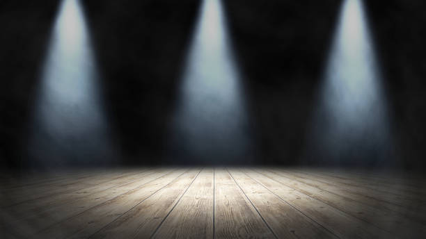 istock Empty stand up scene with wooden floor and spot lights.. Empty room studio gradient used for background and display your product. 3d illustration 1256635777