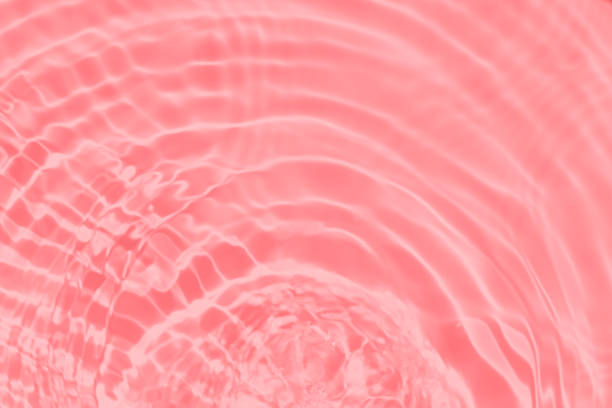 istock pink transparent clear water surface texture summer background 1256637244