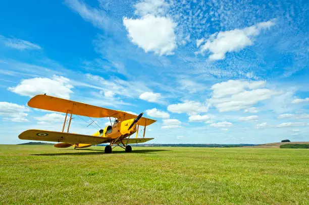 Dorset's picturesque countryside of rolling fields and agricultural land provides a grass landing strip on this grass airfield runway where light aircraft fly from on sunny days in summer