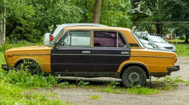 istock an old car with multicolored doors 1256644834