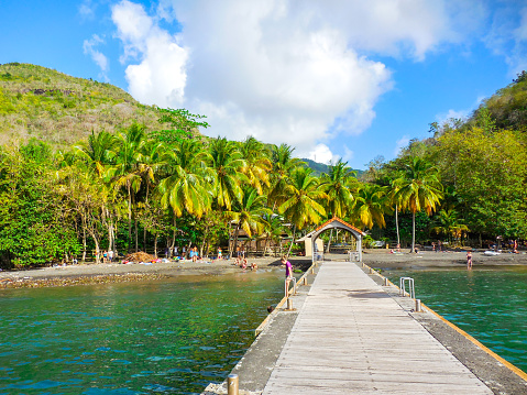 In March 2015, tourists were enjoying the special beach of Anse Noire with black sand in Martinique.