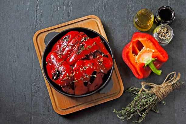 istock Red paprika grill in a cast iron skillet. 1256646516