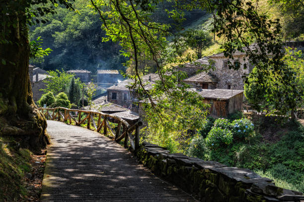 Teixois village, Los Oscos, Asturias. Ethnographic Site dates from the 18th century and is based on the integral use of the hydraulic energy of the river. Teixois village, Los Oscos, Asturias. Ethnographic Site dates from the 18th century and is based on the integral use of the hydraulic energy of the river. asturias photos stock pictures, royalty-free photos & images
