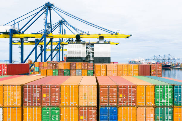 istock Rear view container ship. Business logistic transportation sea freight, Cargo ship 1256647926