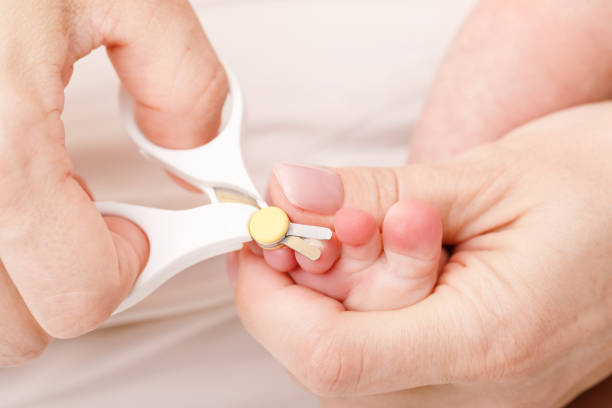 Mother Cuts Newborn Baby Toenails Stock Photo - Download Image Now - Baby - Human Age, Toenail, Cutting - iStock Mother Cuts Newborn Baby Toenails Stock Photo - Download Image Now - Baby - Human Age, Toenail, Cutting - iStock