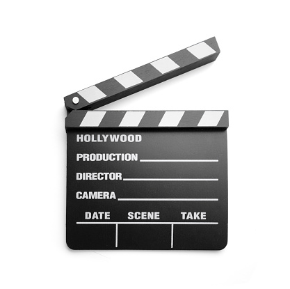Close up of a film slate / film flap/ cinema clap/ on white background.