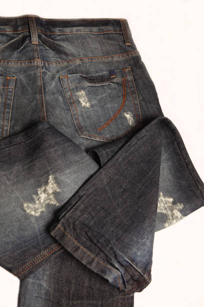 istock Special effect black Jeans Pants on white background 1256657128