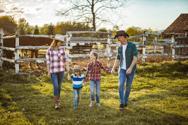 istock Happy family enjoying in their walk on a ranch. 1256661221