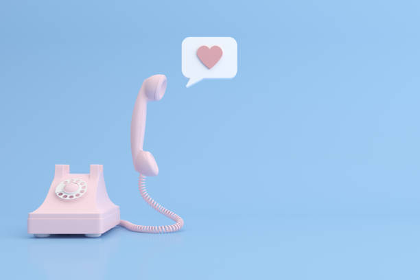 istock Mock up of telephone and heart in speech bubble. 3D rendering. 1256662465