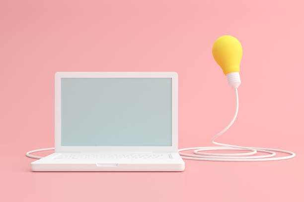 istock Mock up of laptop with light bulb. 3d render. 1256662476