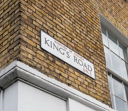 Close up of a street sign for King's Road in London's Chelsea borough.