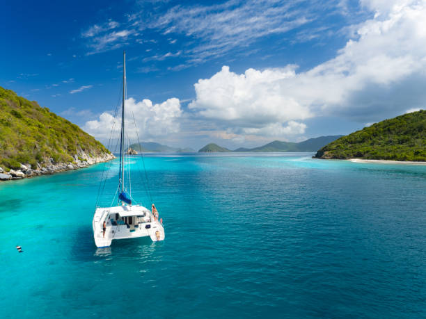 catamaran anchored by lovango cay, virgin islands - vacations couple travel destinations snorkeling imagens e fotografias de stock