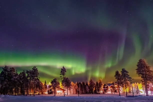 Aurora borealis (also known like northern or polar lights) beyond the Arctic Circle in winter Lapland.