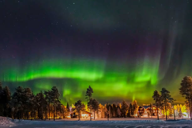 istock Aurora borealis (also known like northern or polar lights) beyond the Arctic Circle in winter Lapland. 1256670461