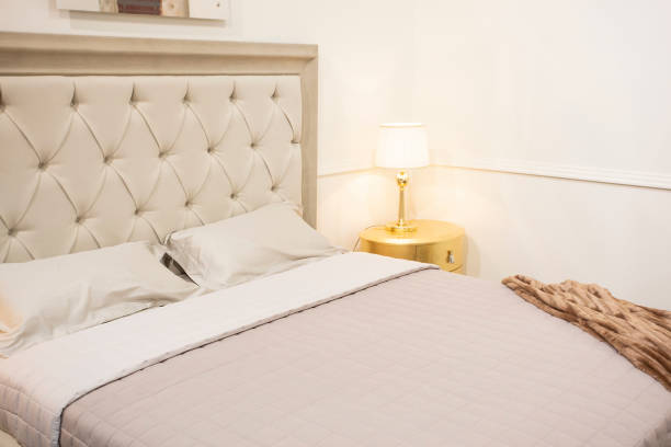 istock Luxury bedroom interior with royal bed with golden elements 1256675565