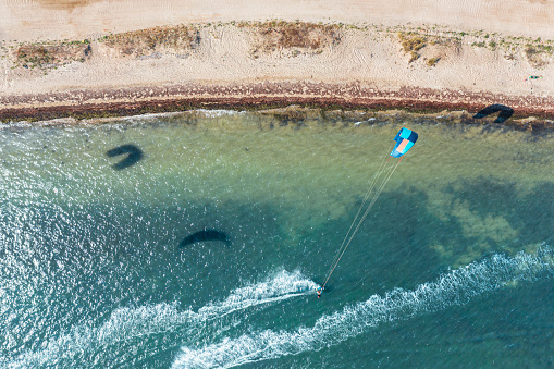 Drone view of kite surfers