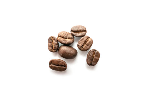 istock Roasted coffee beans isolated on white background. 1256681737