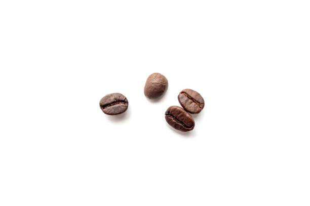 istock Roasted coffee beans isolated on white background. 1256686271