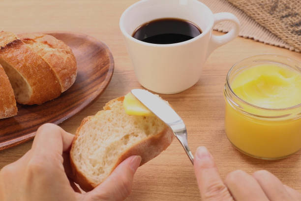 istock The baguette that I spread butter 1256687842