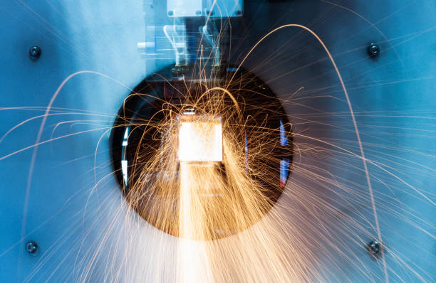istock Laser cutting machine is cutting metal 1256689461