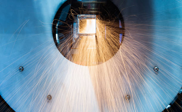 istock Laser cutting machine is cutting metal 1256690765