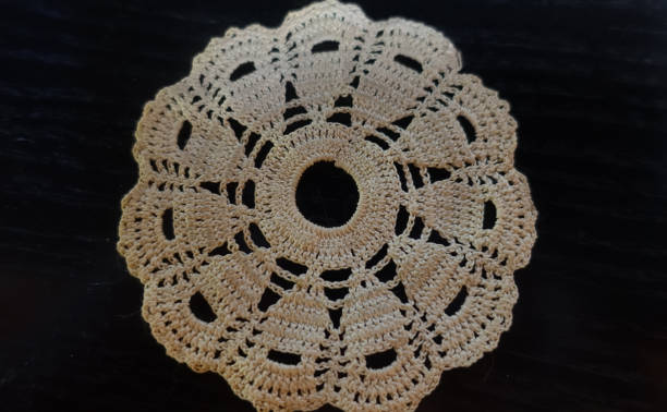 istock Crocheted doily  Crafts of yesteryear 1256691216