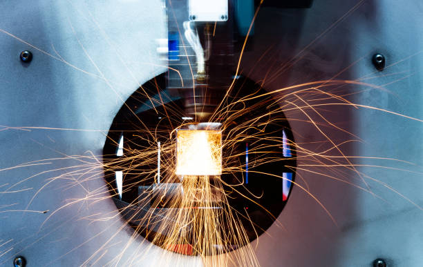 istock Laser cutting machine is cutting metal 1256692692