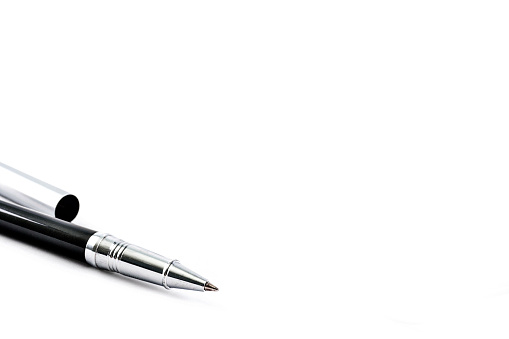 Close up of a modern ballpoint pen isolated on white background.
