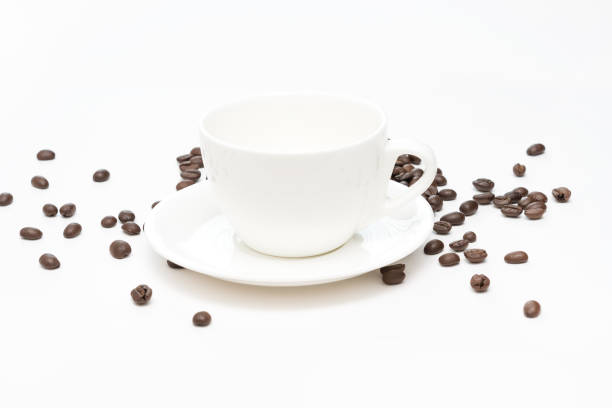 Three white cups with different shapes, low key monochrome.