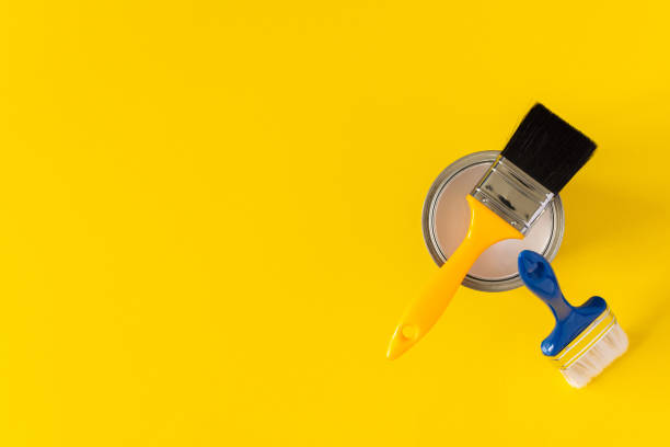 istock Can of white paint with brushes 1256699522
