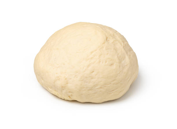 istock fresh raw dough ball on white background 1256699695