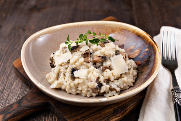 istock Mushroom risotto on plate, close up view 1256699775