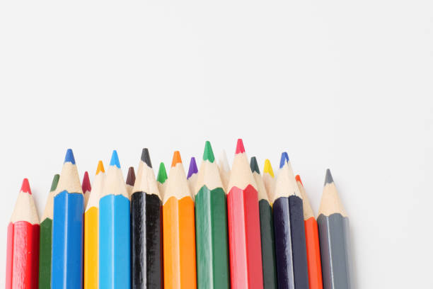istock Colorful colored pencils placed on a white background 1256701144