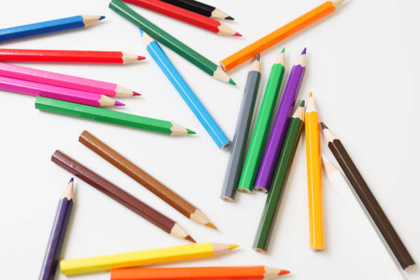 istock Colorful colored pencils placed on a white background 1256701204