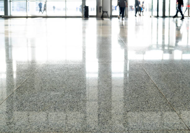 istock People leg walking in office lobby 1256706363