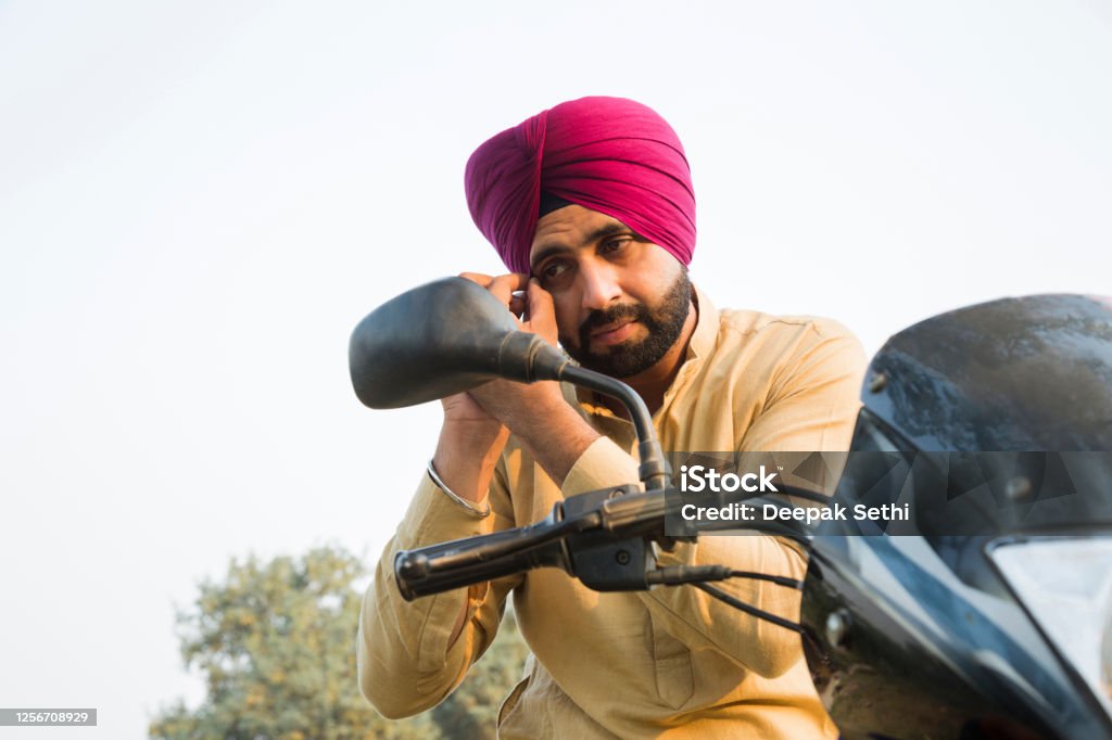 Young Sikh Man - stock photo Indian Ethnicity, Indian Culture, Punjab, Punjabi, Motorcycle Stock Photo