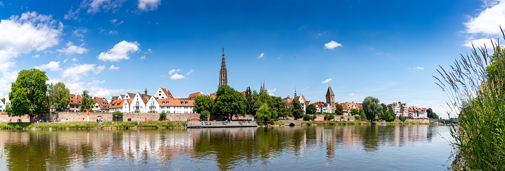 A panorama view of the city of Ulm in southern Germany with the Danube River in front