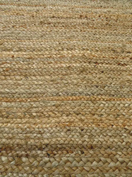 Photo of Brown color Traditional wicker surface texture pattern. Woven esparto grass background. Jute. Natural vegetable fiber handcraft.