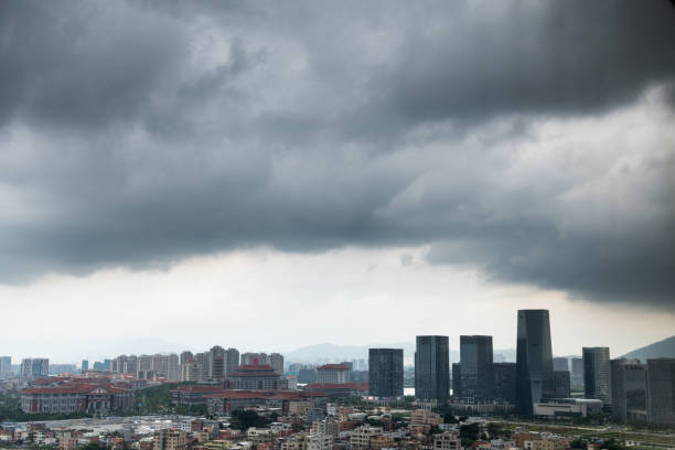 istock Dark stormy clouds over Chinese city 1256714348