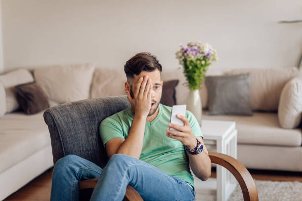 istock Shocked young man watching something online 1256724217