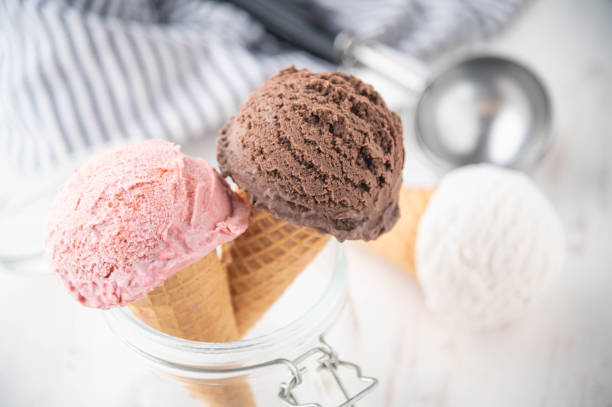 istock ice creams on cones with three tastes 1256727714