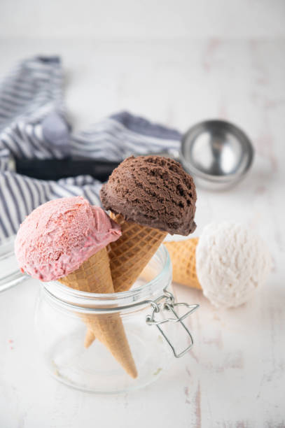 istock ice creams on cones with three tastes 1256727743