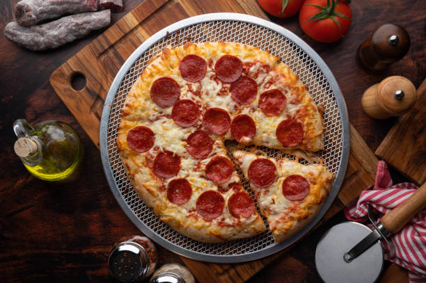 istock pepperoni pizza with melting cheese 1256727898